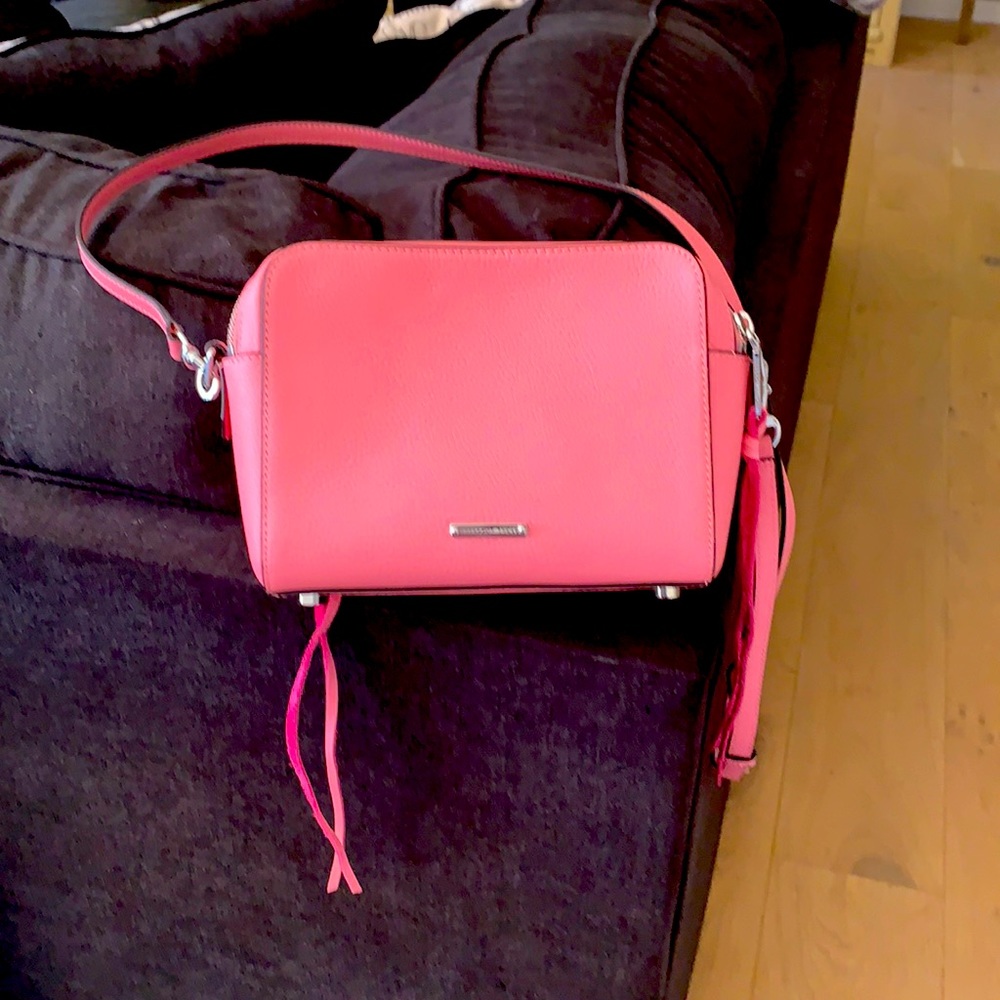 Women pink pocketbook